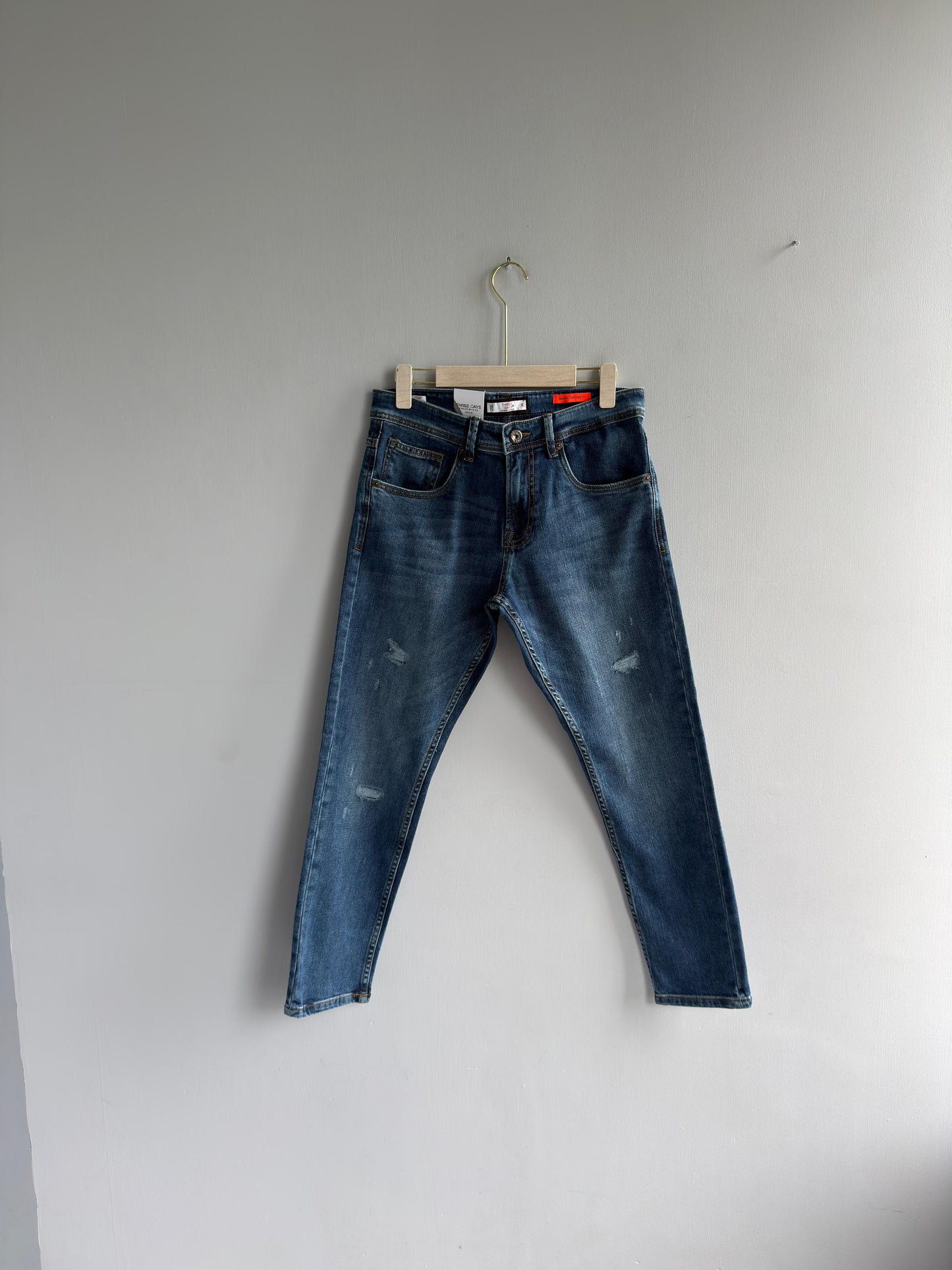 BLUE TORN DENIM TROUSERS
