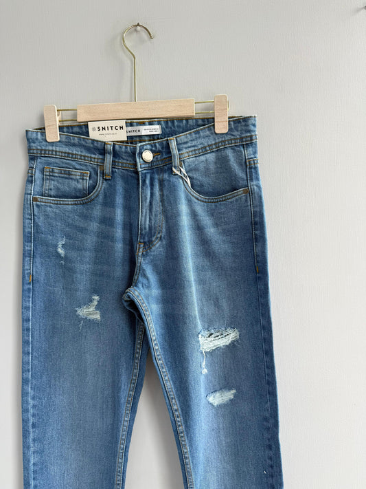 LIGHT BLUE TORN DENIM TROUSERS