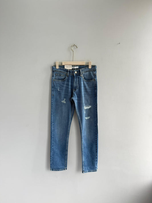 LIGHT BLUE TORN DENIM TROUSERS