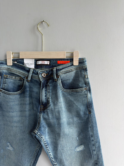 LIGHT BLUE TORN DENIM TROUSER