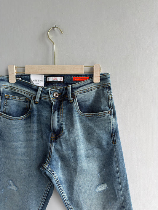 LIGHT BLUE TORN DENIM TROUSER
