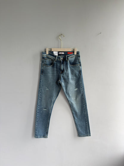 LIGHT BLUE TORN DENIM TROUSER