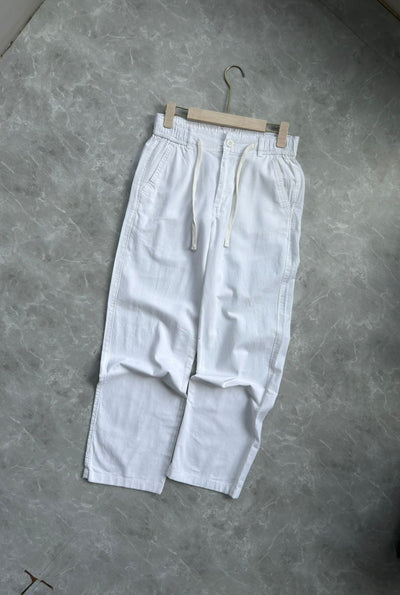 WHITE BAGGY LINEN TROUSERS